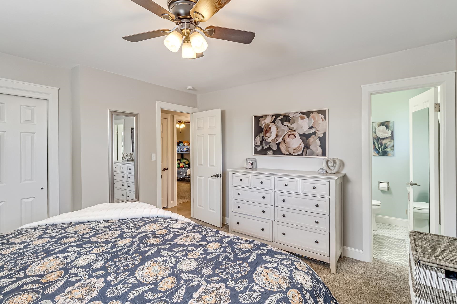 2118 Saguaro Road Grand Junction, CO 81507 - Photo 11 of 42 a bedroom with a bed and closet