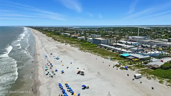 an aerial view of a building with outdoor space