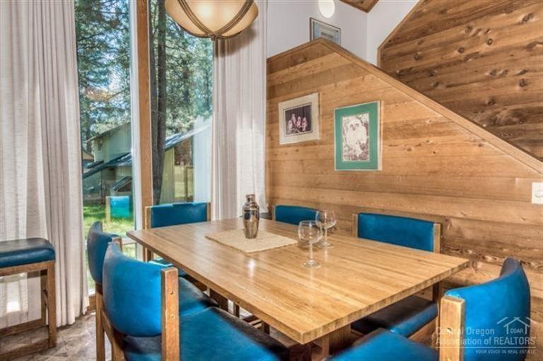 17 Ranch Cabin Road Sunriver, OR 97707 - Photo 6 of 23 a dining room with furniture and wooden floor