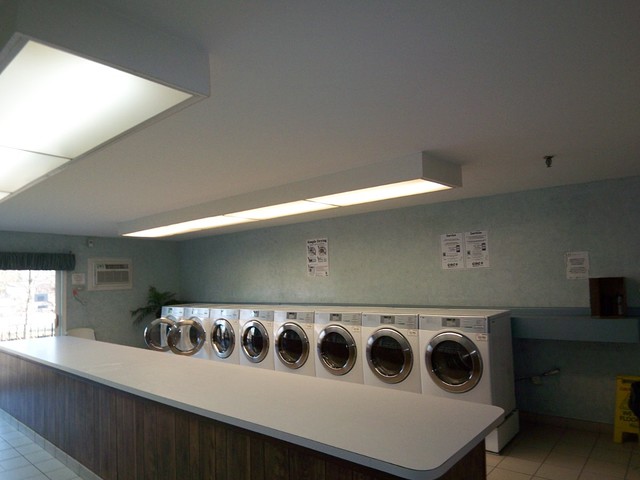 235 North Mill Road, Unit 106B Addison, IL 60101 - Photo 23 of 24 a view of a utility room with washer and dryer