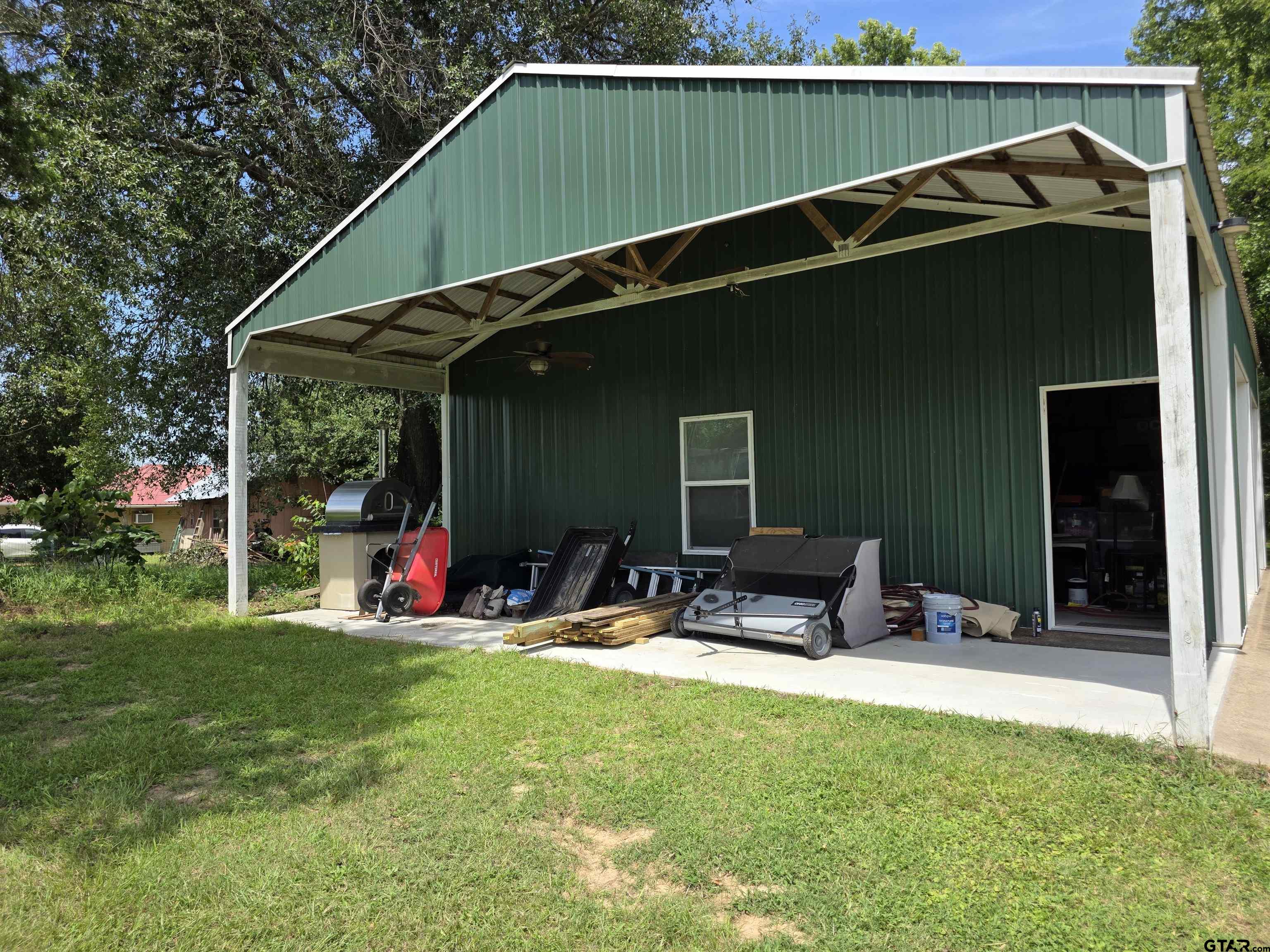 6170 Highway 271 Mount Pleasant, TX 75455 - Photo 29 of 43 a view of a chair and table in backyard of the house