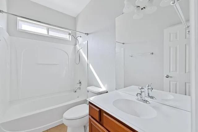 a bathroom with a sink toilet and a bathtub