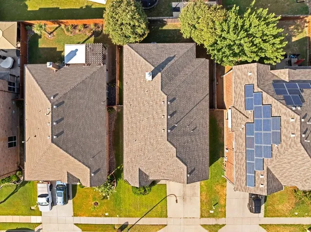 front view of a house with a street