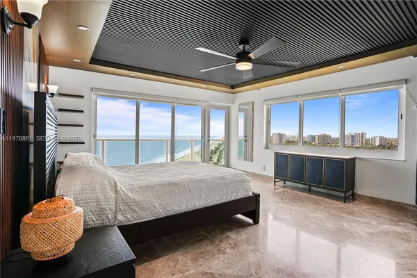 a bedroom with a bed and dresser