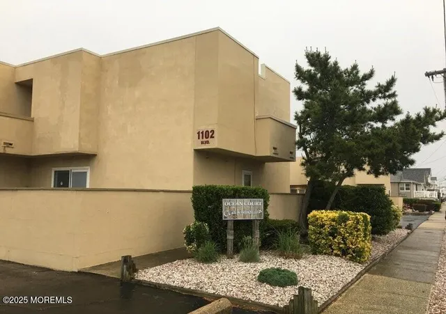 a backyard of a house with seating space