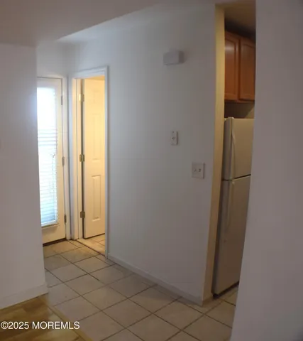 a bathroom with a shower and a toilet