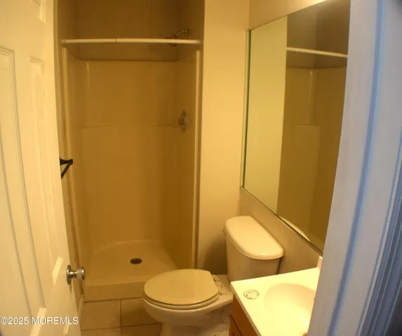 a kitchen with a sink stove and microwave