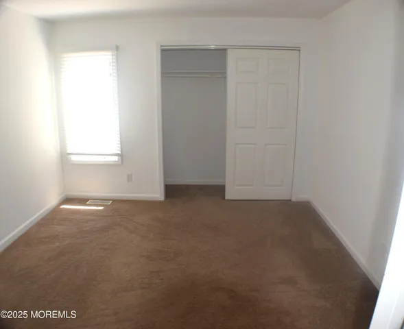 an empty room with a door