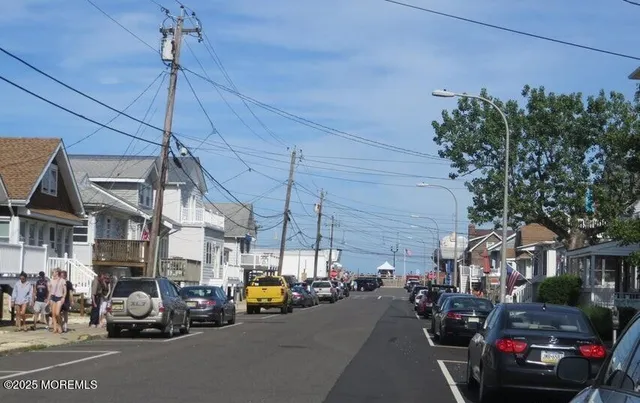 a view of roof deck with furniture
