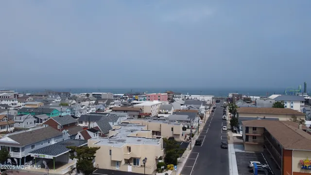 an aerial view of a city with lots of residential buildings