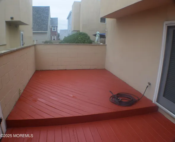 a view of a hallway with stairs