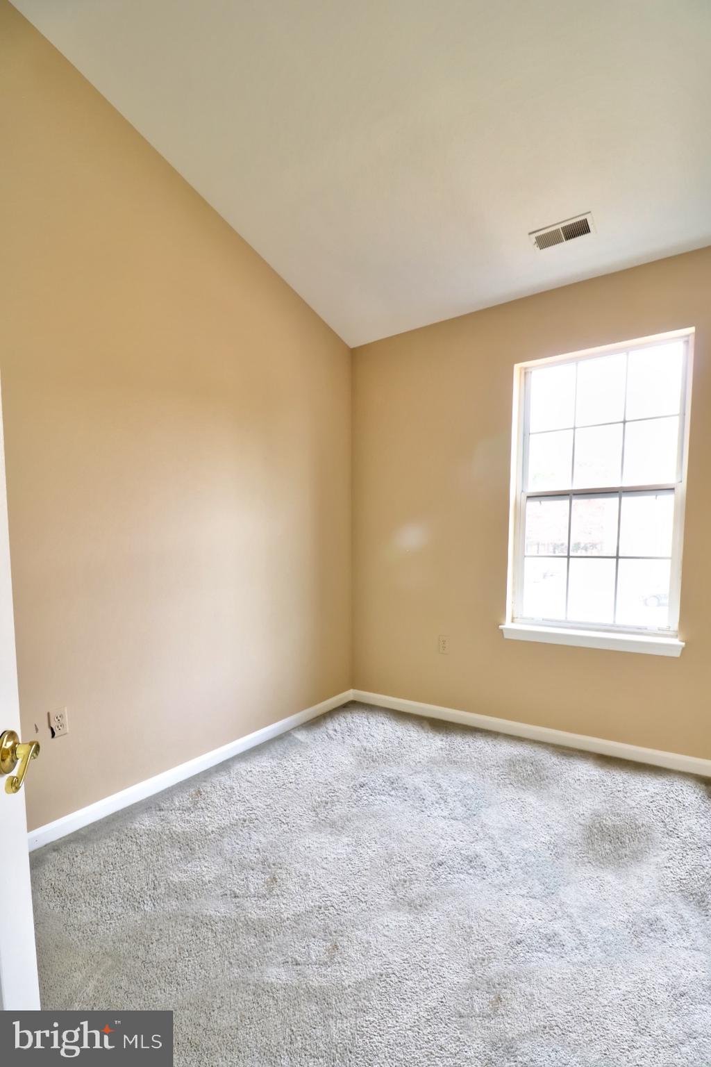 4219 Huntshire Road Randallstown, MD 21133 - Photo 16 of 24 3rd Bedroom w/ Vaulted Ceilings