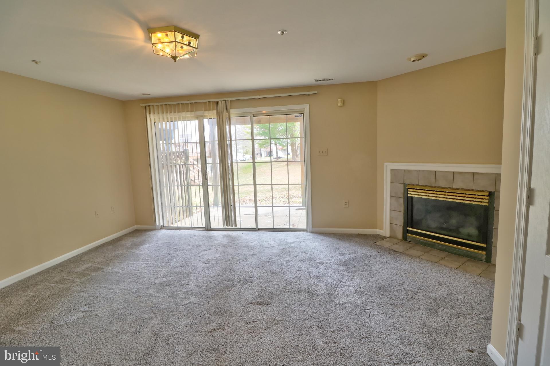 4219 Huntshire Road Randallstown, MD 21133 - Photo 18 of 24 Cozy Family Room w/ Fireplace