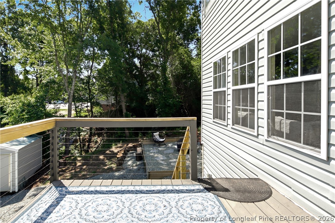 1075 Buffalo Lake Road Sanford, NC 27332 - Photo 41 of 49 a view of balcony with wooden floor