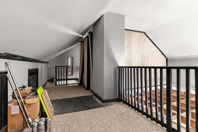 a view of a hallway with workspace