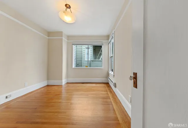 a kitchen with stainless steel appliances granite countertop a refrigerator and a stove