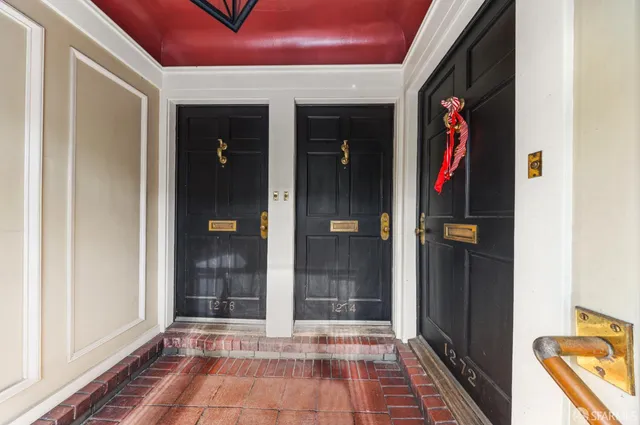a kitchen with cabinets stainless steel appliances and a sink