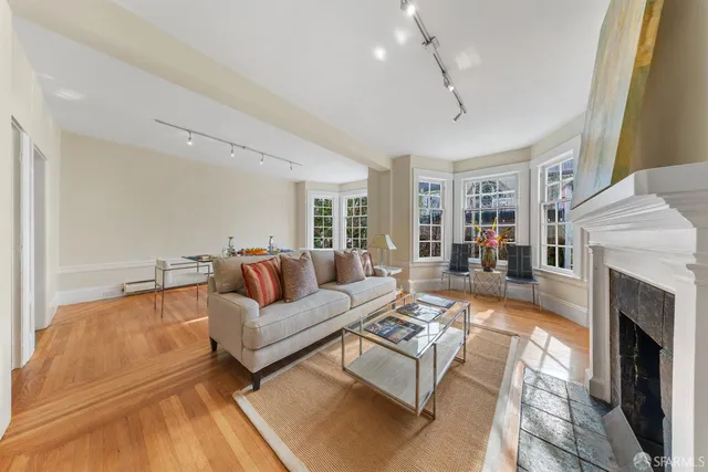 a bathroom with a sink a mirror and a bathtub