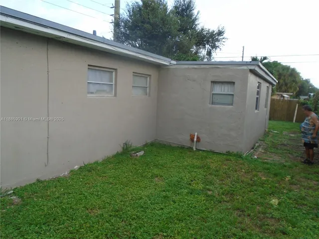 a view of balcony and yard