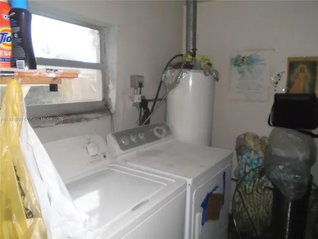 a bathroom with a sink toilet and a mirror