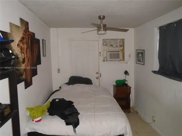a dining room with furniture and rug space