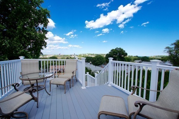 49 Faywood Avenue Boston, MA 02128 - Photo 1 of 30 a view of a chair and table on the deck