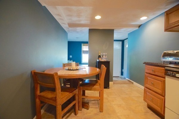 49 Faywood Avenue Boston, MA 02128 - Photo 28 of 30 a view of a dining room with furniture