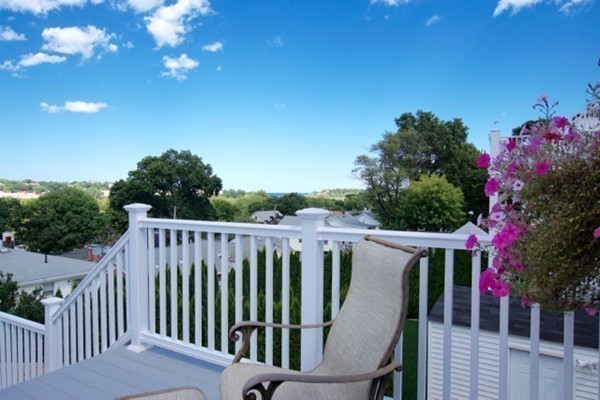 49 Faywood Avenue Boston, MA 02128 - Photo 8 of 30 a view of a porch and a yard