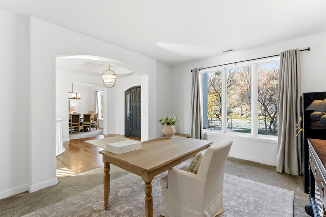 1878 East Ridge Point Drive Bountiful, UT 84010 - Photo 6 of 92 Dining room with light colored carpet and arched walkways