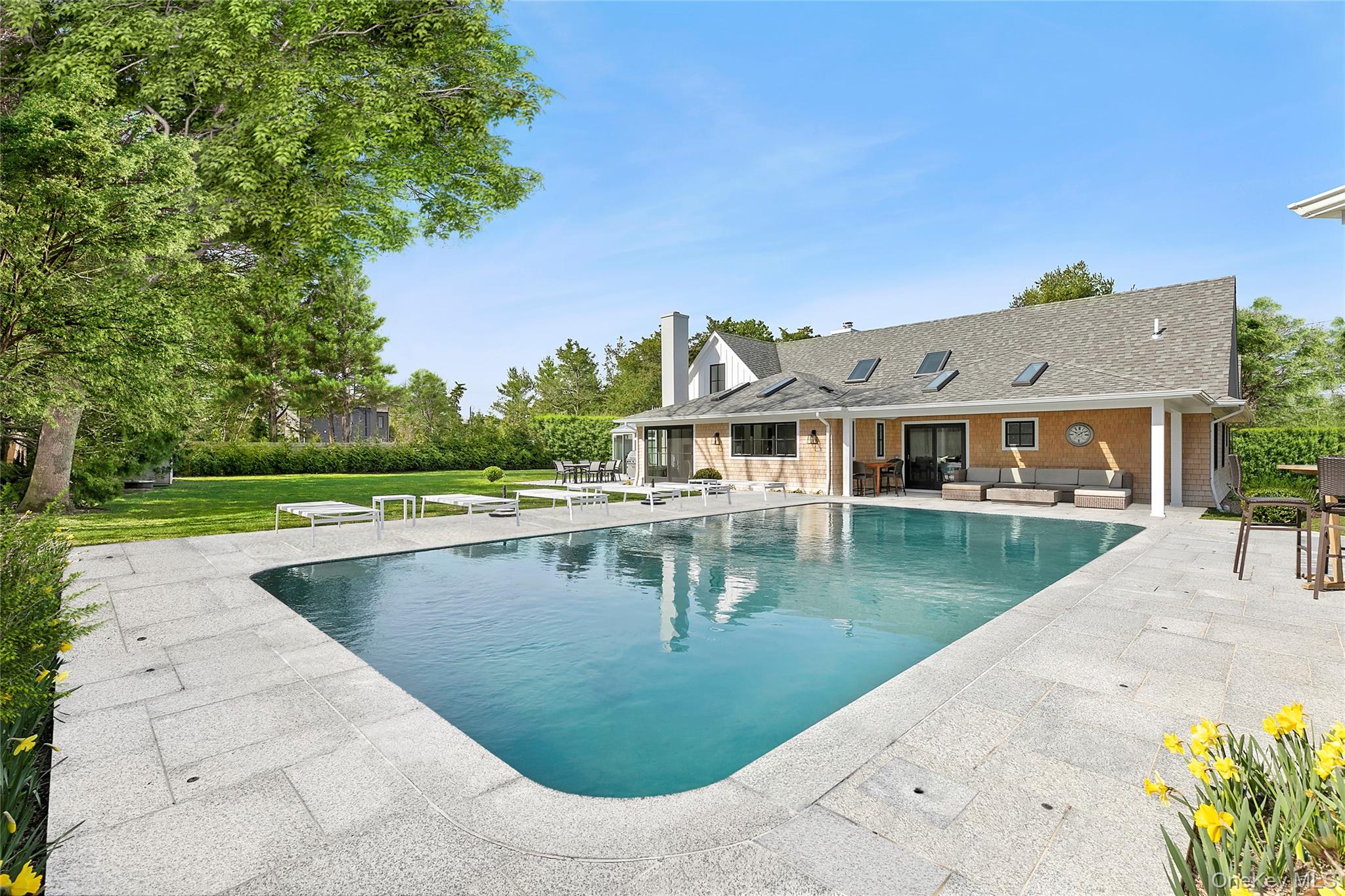 8 Shore Road Remsenburg, NY 11960 - Photo 17 of 21 a view of pool with outdoor seating