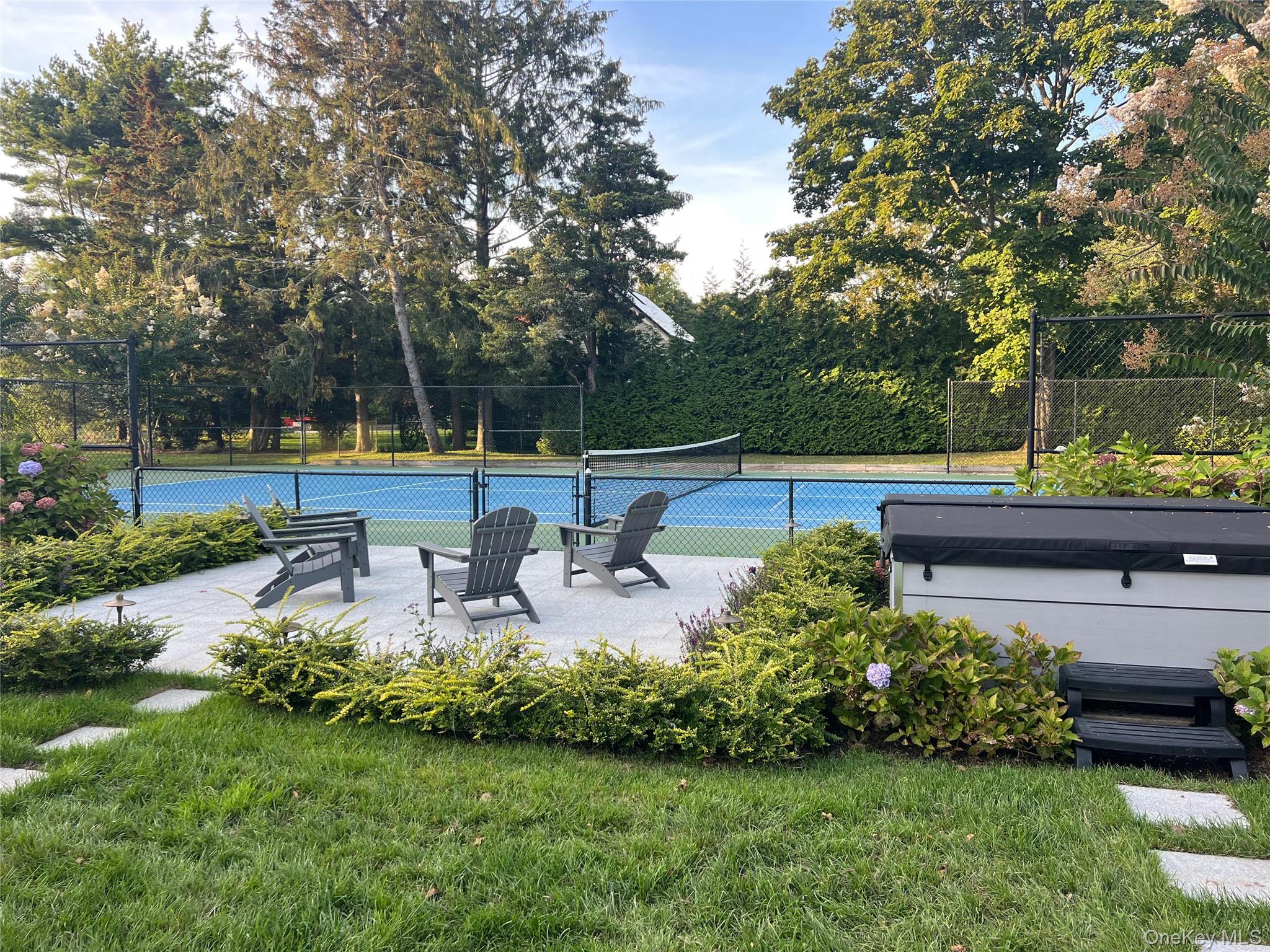 8 Shore Road Remsenburg, NY 11960 - Photo 18 of 21 a view of a swimming pool with a patio