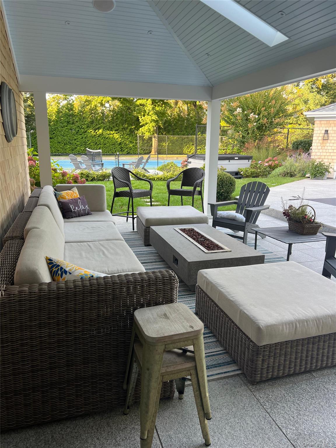 8 Shore Road Remsenburg, NY 11960 - Photo 21 of 21 a outdoor space with furniture and garden view