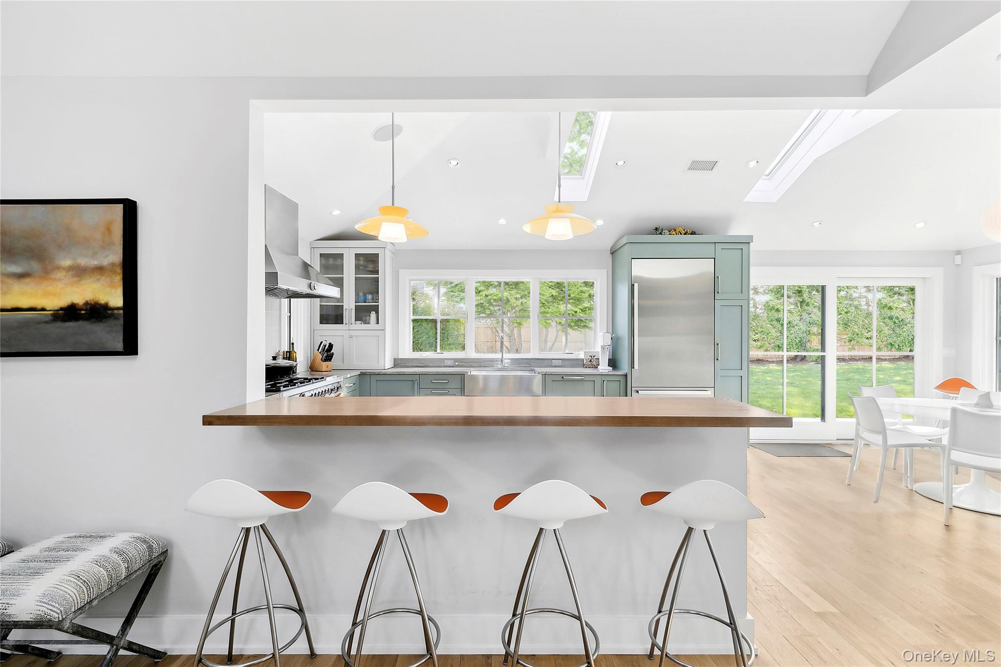 8 Shore Road Remsenburg, NY 11960 - Photo 7 of 21 a dining area with furniture and window