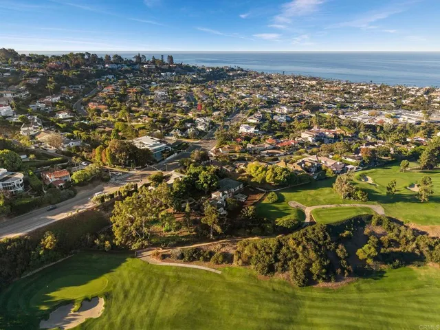 a view of a lake with a big yard