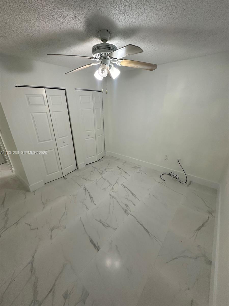 324 East 34th Street Hialeah, FL 33013 - Photo 25 of 37 a view of a room with a fan