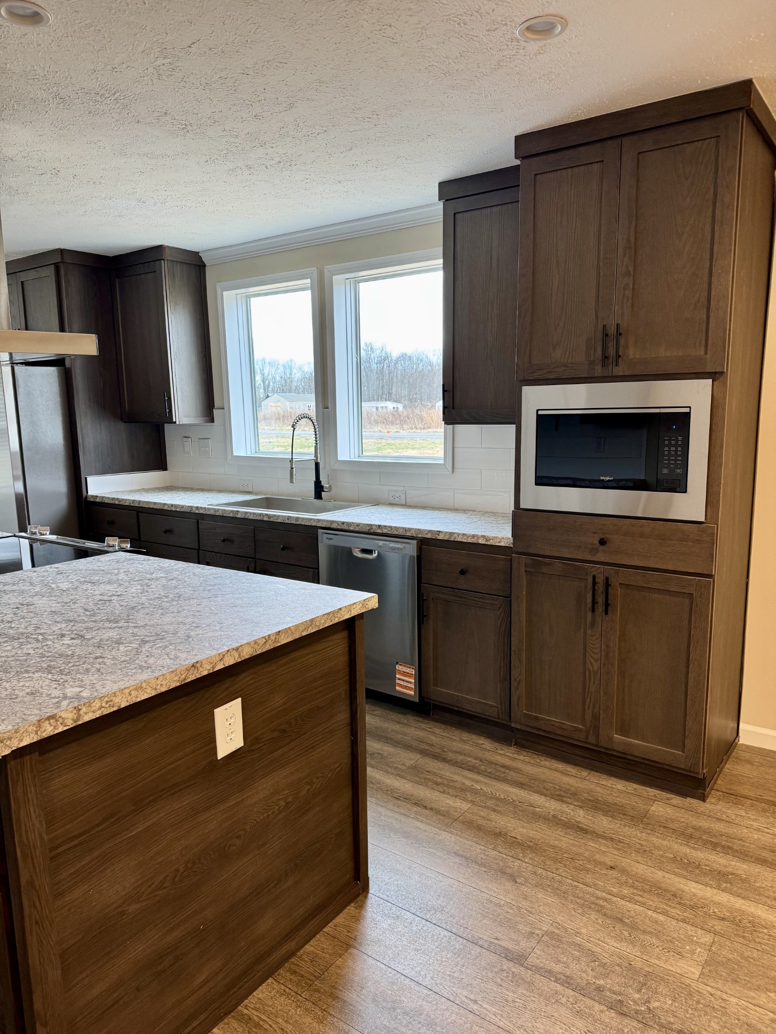 235 Ralph Spivey Lane Gainesboro, TN 38562 - Photo 16 of 39 a kitchen with a stove and a sink