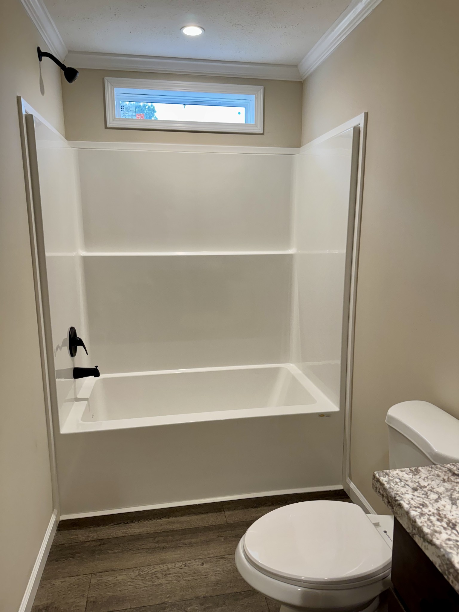 235 Ralph Spivey Lane Gainesboro, TN 38562 - Photo 28 of 39 a bathroom with a toilet and a shower