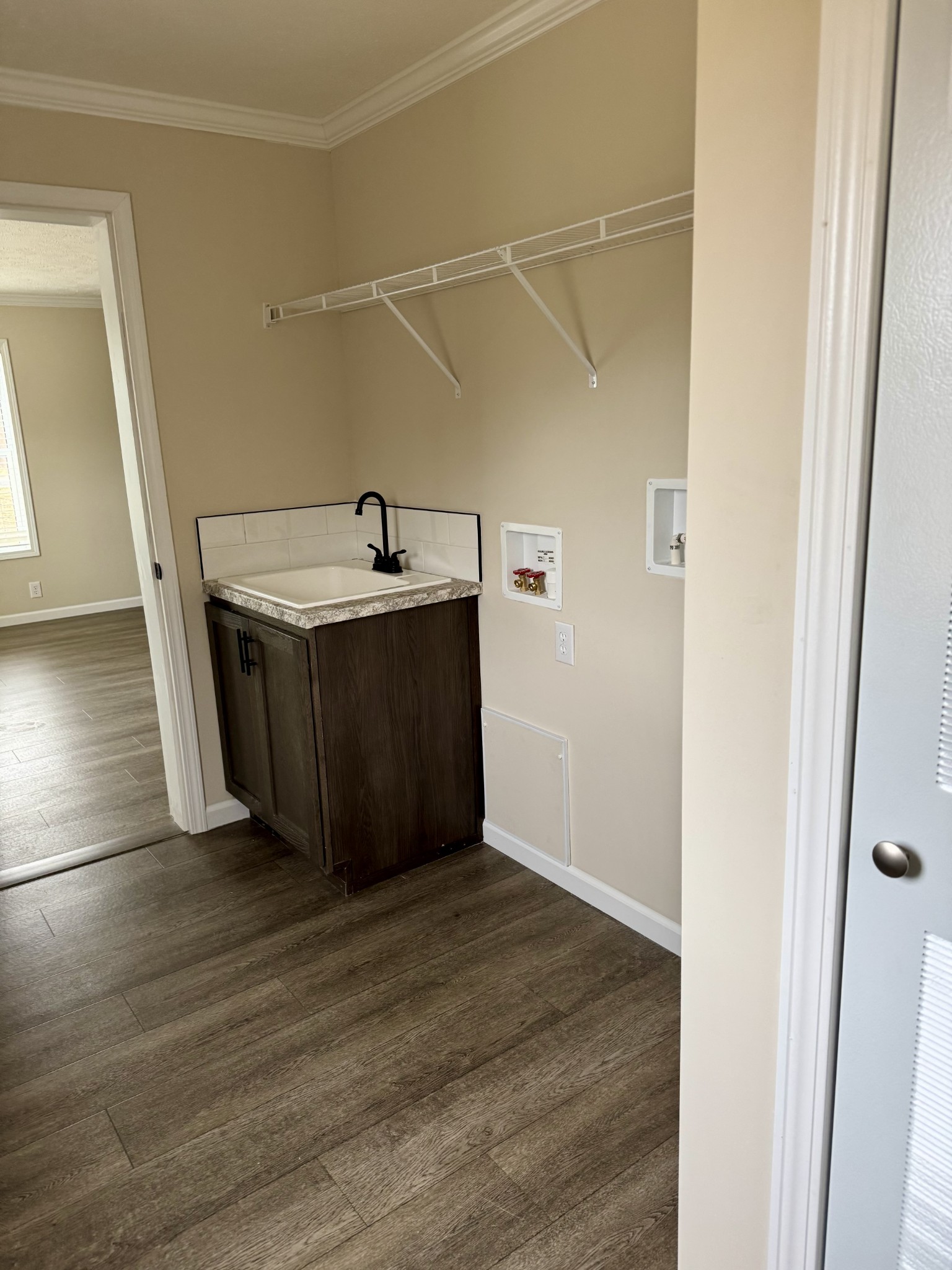 235 Ralph Spivey Lane Gainesboro, TN 38562 - Photo 38 of 39 a view of a storage & utility room with wooden floor
