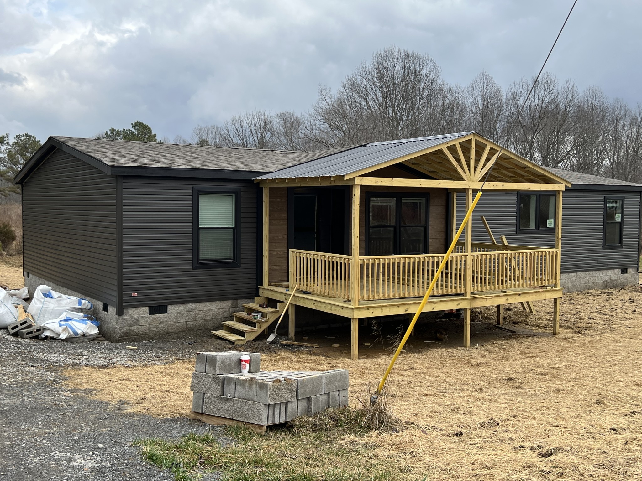 235 Ralph Spivey Lane Gainesboro, TN 38562 - Photo 6 of 39 a view of a house with wooden deck