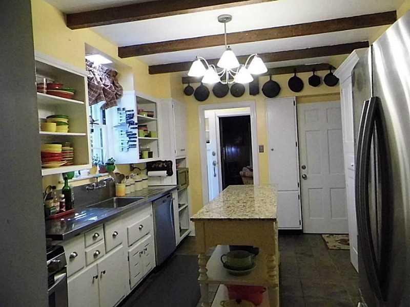 526 Sangree Road Pittsburgh, PA 15237 - Photo 12 of 25 Kitchen. Another view of the kitchen has updated wiring. Owners preferred the open cabinets but they do have the doors for them.