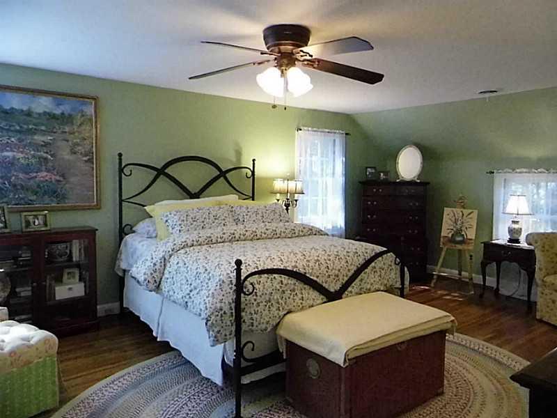 526 Sangree Road Pittsburgh, PA 15237 - Photo 16 of 25 Master Bedroom. Huge master bedroom with ceiling fan, hardwood floors, a walk-in closet plus 2 smaller closets (his & hers and one has cedar.
