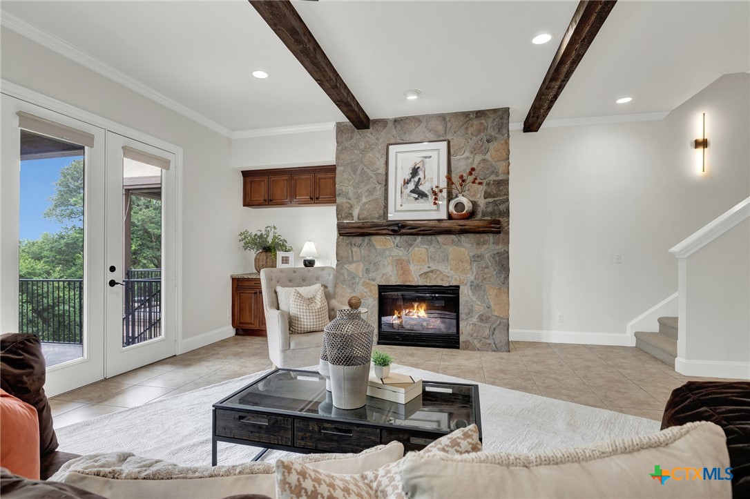 1029 Gruene Road New Braunfels, TX 78130 - Photo 11 of 48 a living room with furniture and a fireplace