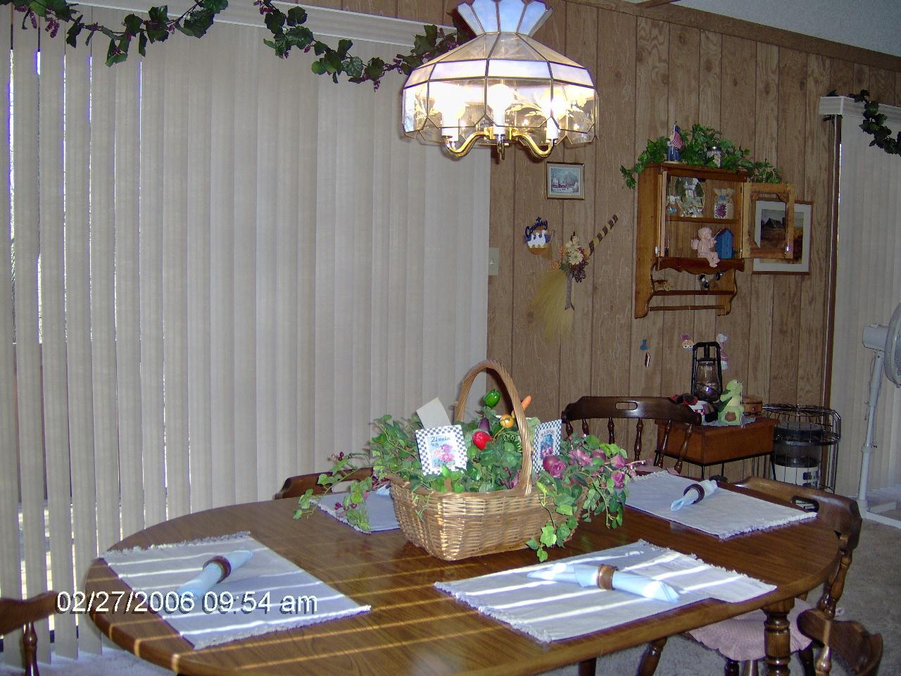 1243 Salsibury Road Bushkill, PA 18324 - Photo 4 of 8 a view of a dining room with furniture and chandelier