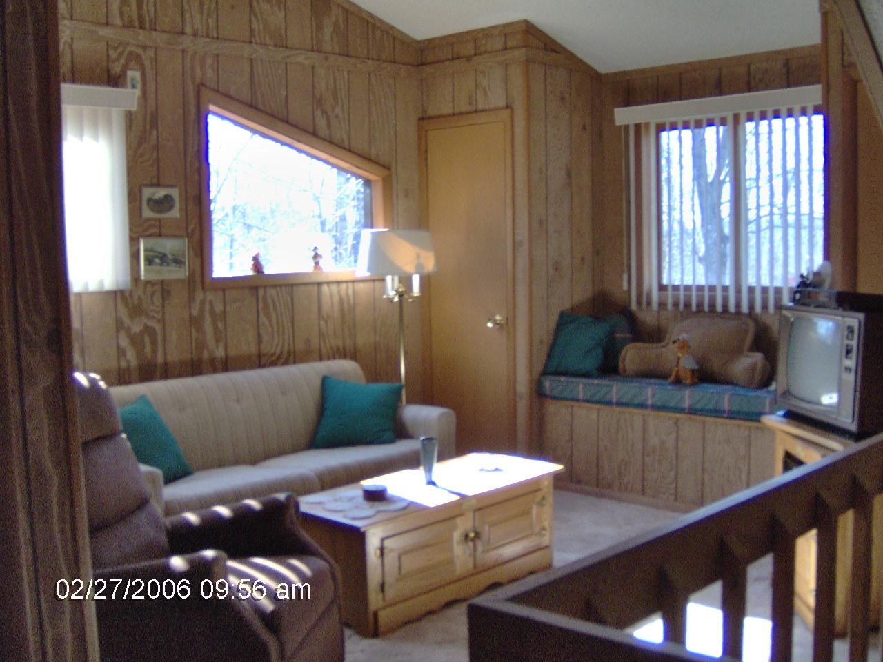 1243 Salsibury Road Bushkill, PA 18324 - Photo 6 of 8 a living room with furniture and a window