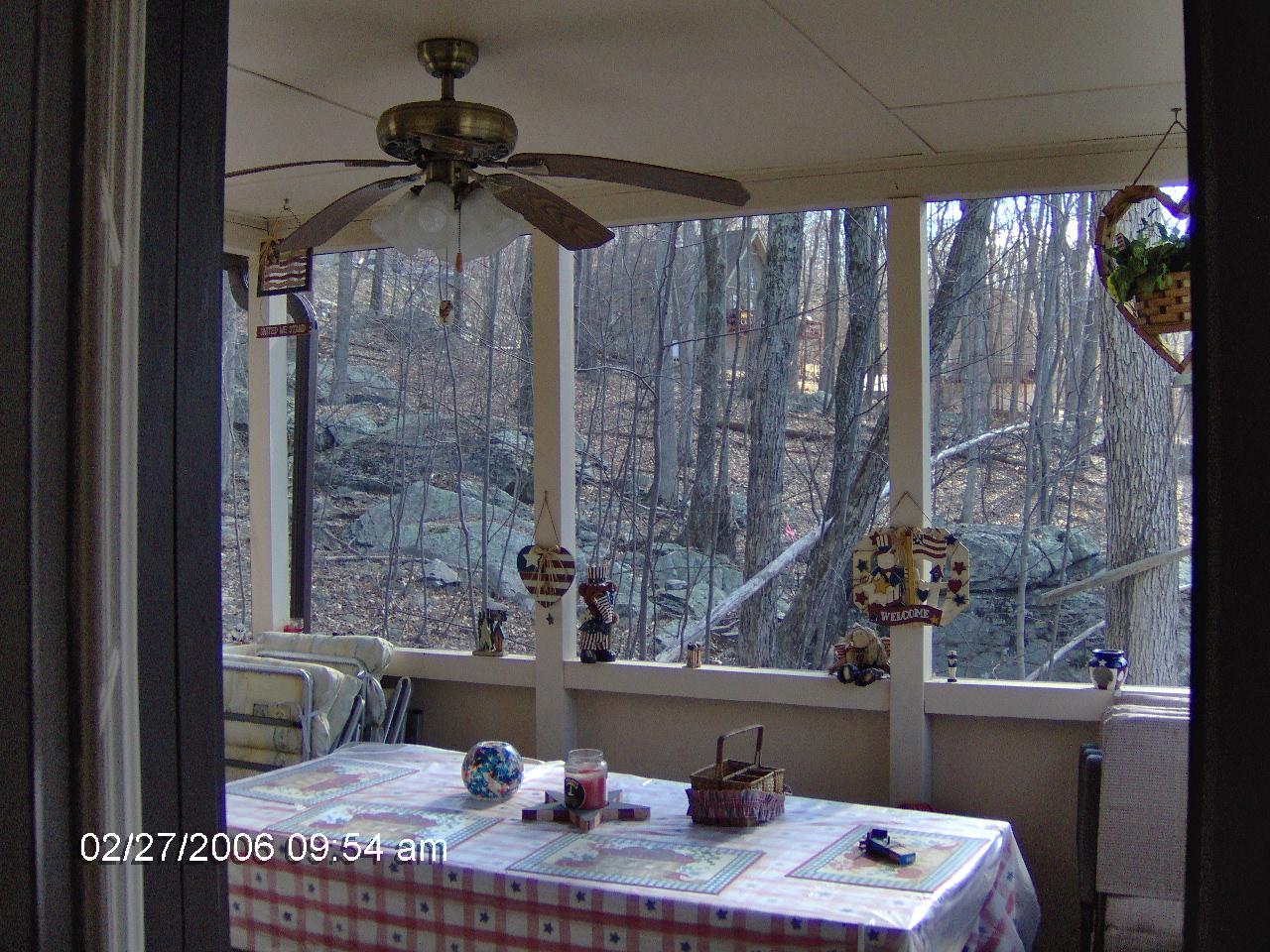 1243 Salsibury Road Bushkill, PA 18324 - Photo 7 of 8 a dining room with a table and chairs