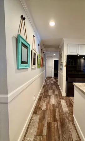 a view of a kitchen with a sink and microwave