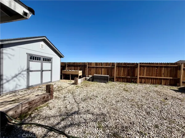 a view of backyard of house