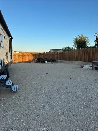 a view of a room with a table and chair
