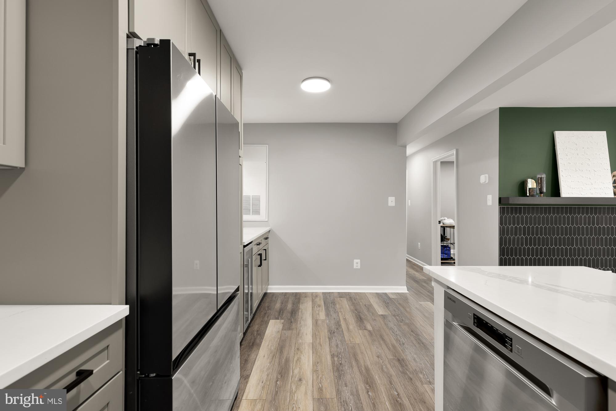 2221 Lovedale Lane, Unit 202B Reston, VA 20191 - Photo 11 of 27 a view of a kitchen from the hallway