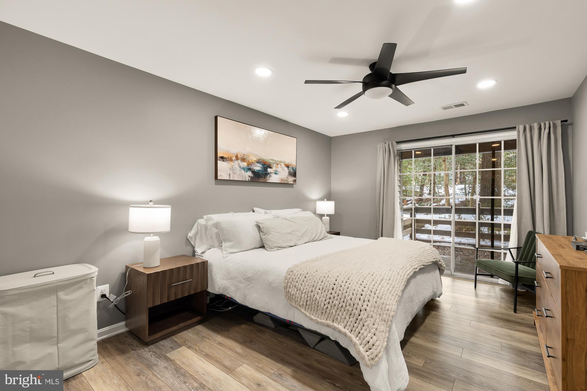 2221 Lovedale Lane, Unit 202B Reston, VA 20191 - Photo 12 of 27 a bedroom with a large bed and a large window